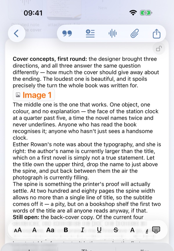 The same toolbar on iPhone, above the keyboard, with an inline image marker in the text.
